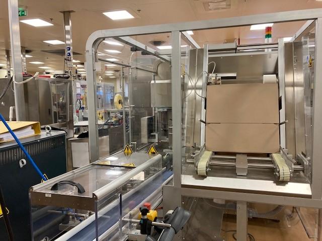 Combined sideloading case packer and palletizer PESTER PEWO FORM SLP 2k