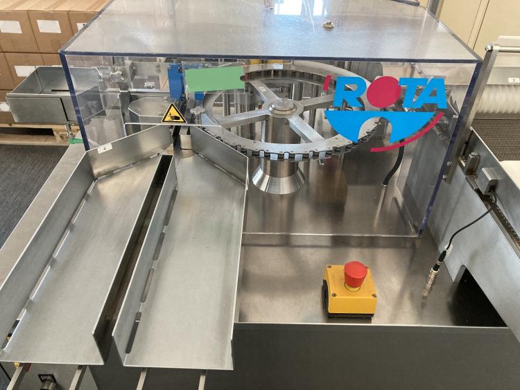 Labelling machine for ampoules and vials ROTA RE200