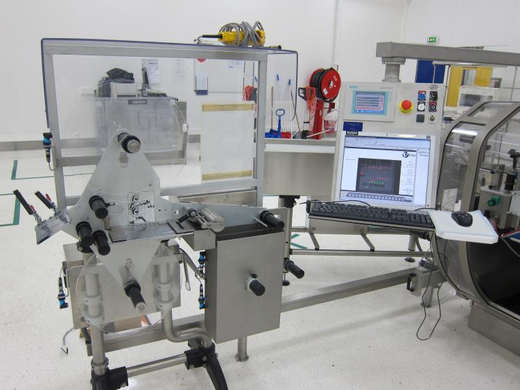 high speed linear labelling machine for ampoules, vials or cylindrical containers NERI BL600